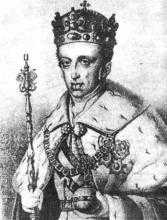 Cisár Ferdinand I. v plnej vladárskej paráde. Dobové portréty ho samozrejme ukazujú krajšieho a hlavne oduševnenejšieho, než v skutočnosti bol. Ktovie, ako by vyzeral na fotografii. Fotoportrét jeho mladšieho brata Františka Karola sa zachoval a možno o ňom povedať, že to nie je žiadna sláva. A podľa fotografie synovca jeho manželky /neskôr talianskeho kráľa/ vieme, že to bol dokonca človek až „roztomilo ohyzdný"!