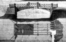 Časť Belághovho plánu s pohľadom na navrhovaný drevený most ponad Mlynský náhon. Koryto náhona je podané v reze. V spodnej časti obrázka vidno konštrukciu mostovky, tvorenú šiestimi silnými drevenými trámami, cez ktoré boli naprieč položené fošne. Mostovka má komunikáciu rozdelenú na pešiu a vozovú časť, mohli po nej teda prechádzať aj jazdci, vozy a kočiare.
